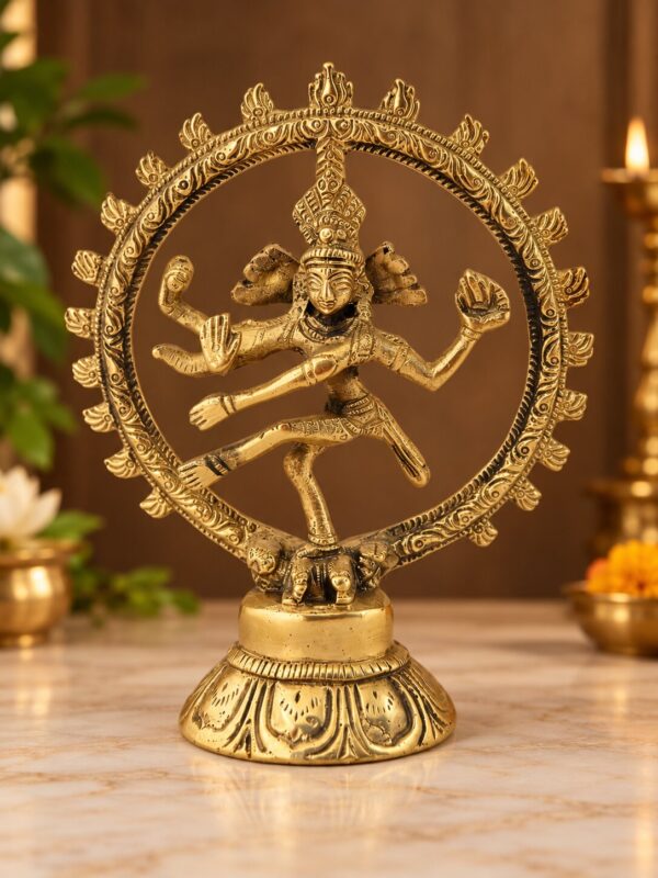 Brass Nataraja statue showing its dancing pose and decorative pedestal